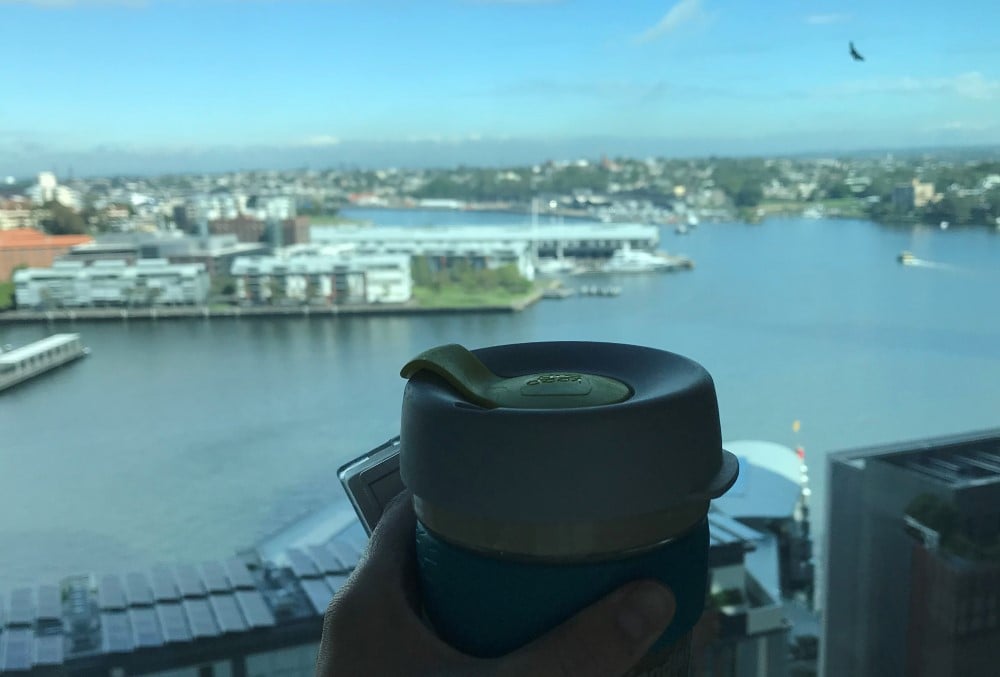 Capgemini Australia Graduate - Cup of coffee and a outside view from a window