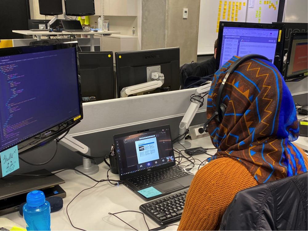 A young professional at her office desk