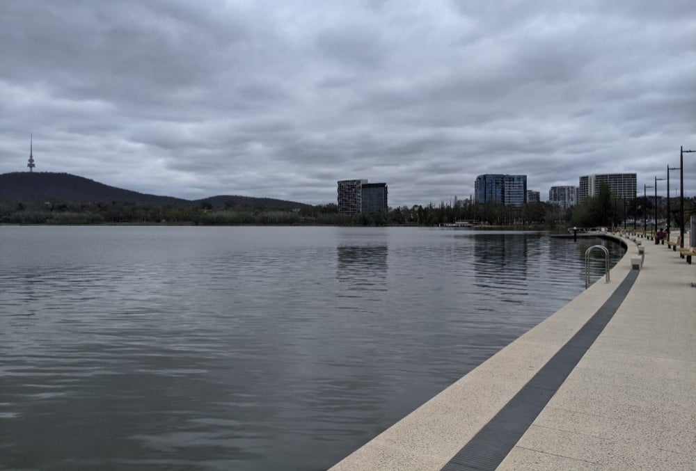 Clayton Utz - Young male lawyer's photo of Lake Burley Griffin
