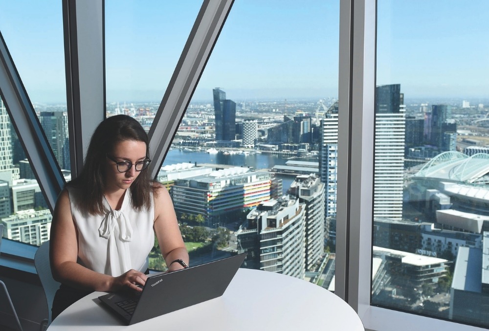 KPMG Bianca Weiss at work with a beautiful view of Melbourne