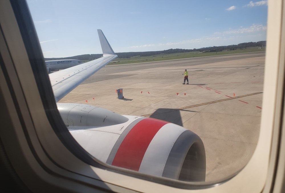 Capgemini Australia Graduate - Plane window, wing and propeller
