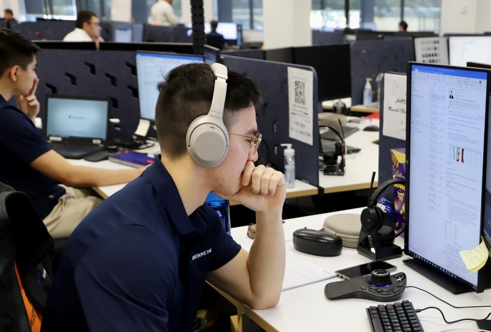  day-in-a-life-rheinmetall-defence-george-gett-at-his-desk