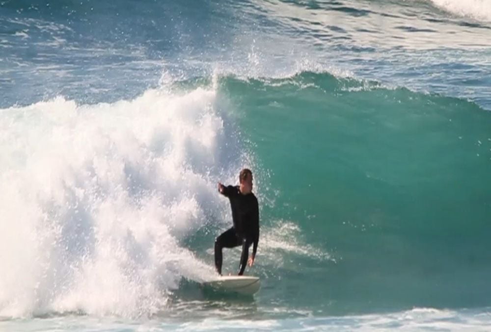 Clyde & Co Graduate Thomas Miletich surfing