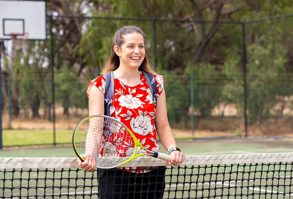Saab Graduate Megan Franzon playing tennis