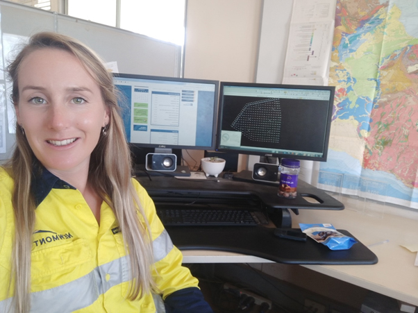 Newmont Graduate Courtney Anders at her desk