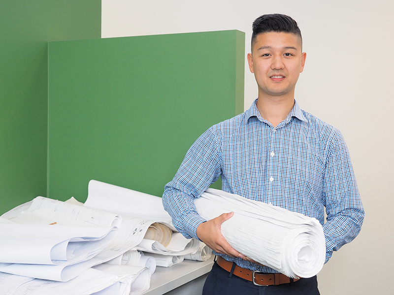 Day in the life_Honeywell_Jake St Mark_800x600 2018 holding papers