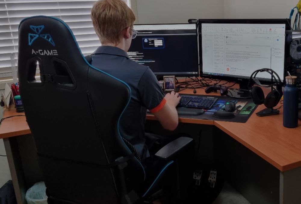 Nova systems Patrick Wilson working on his desk