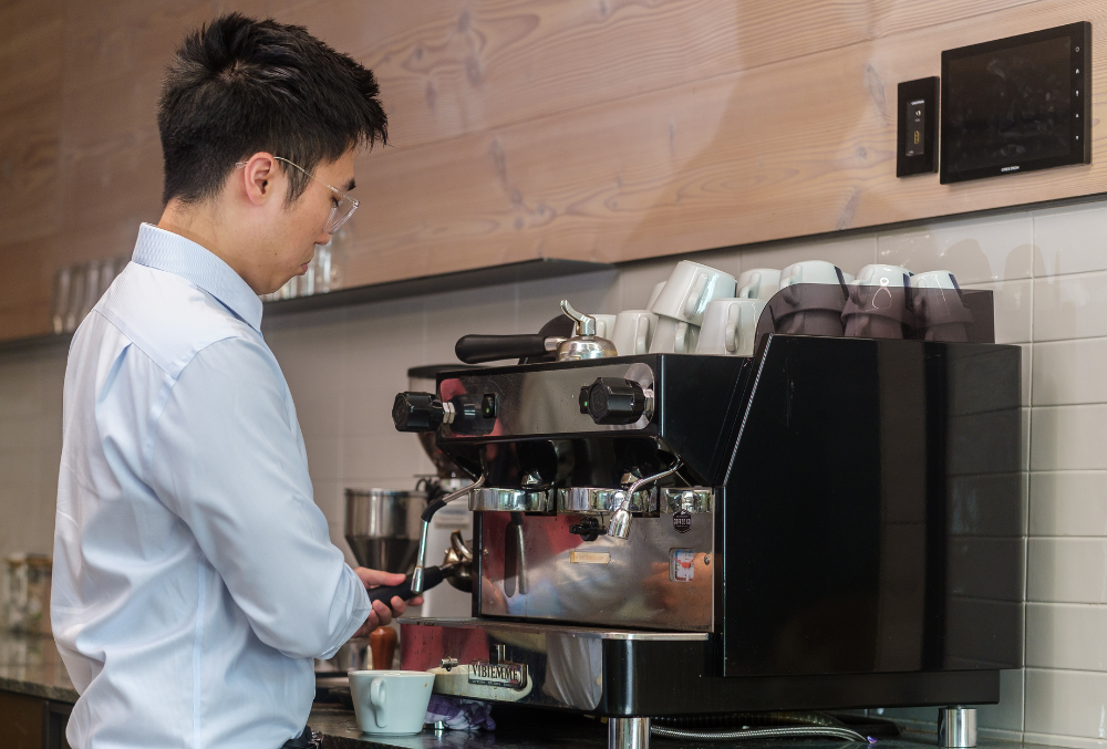 day in the life Russell McVeagh TK Lo at the coffee station