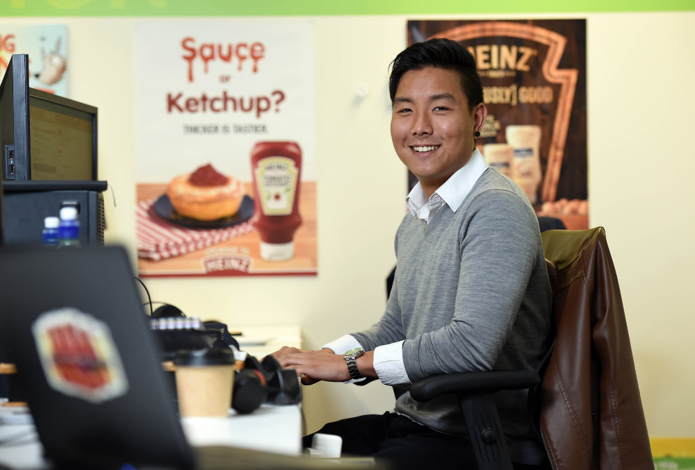 Kraft Heinz graduate Calvin Lee at his office desk