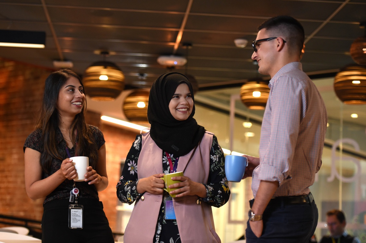 Telstra: Eman Younus - cup of tea with co-workers