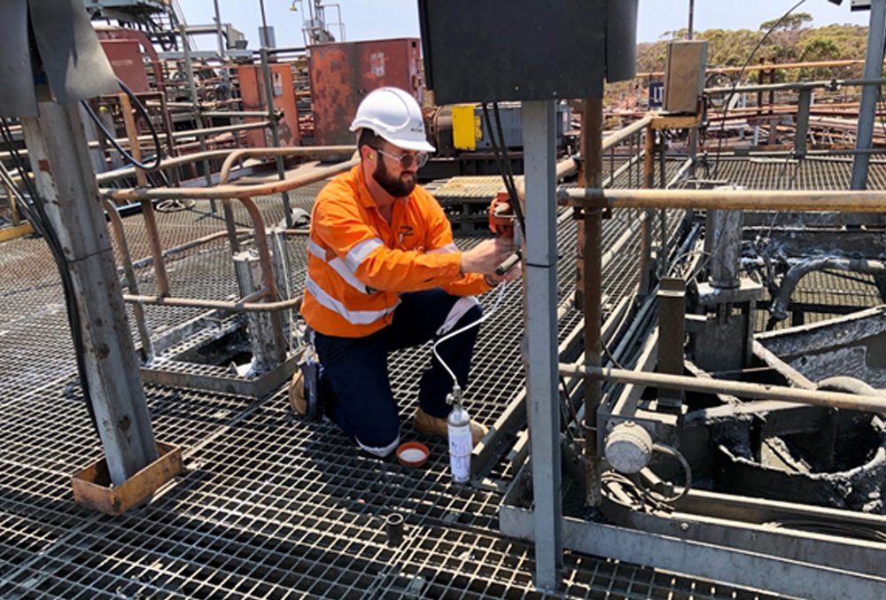 Newmont Australia Graduate Trent George-Kennedy testing an equipment